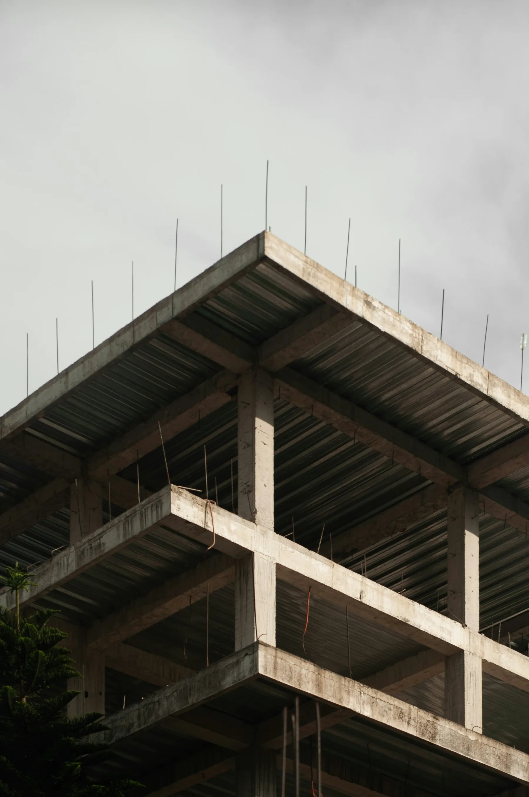 Active commercial construction site with structural framing.